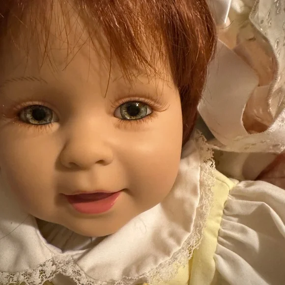 Adorable Baby Doll with Pink Bow - Picture 8 of 9